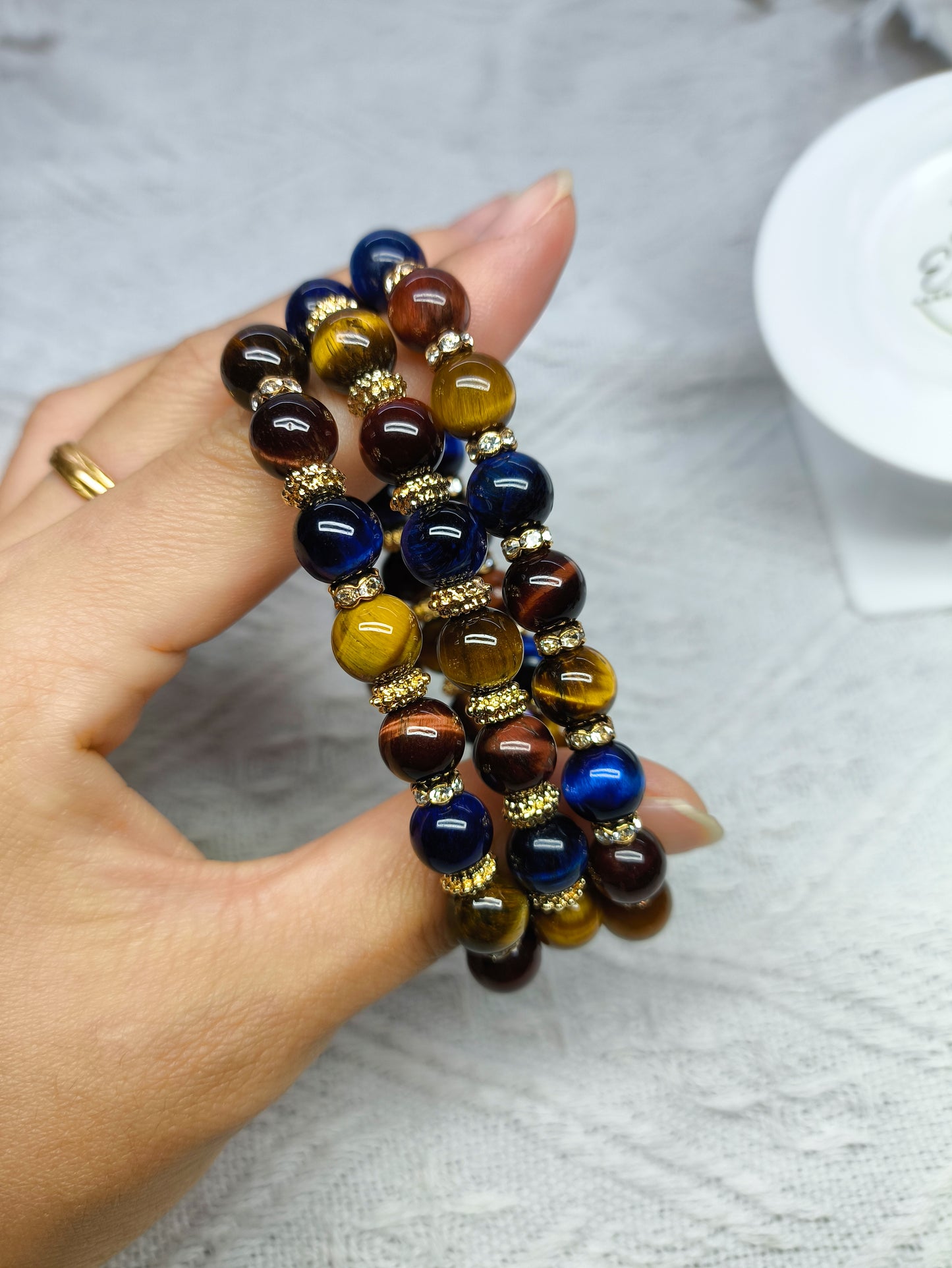 Red Tiger Eye • Yellow Tiger Eye • Blue Tiger Eye • Crystal Bracelet